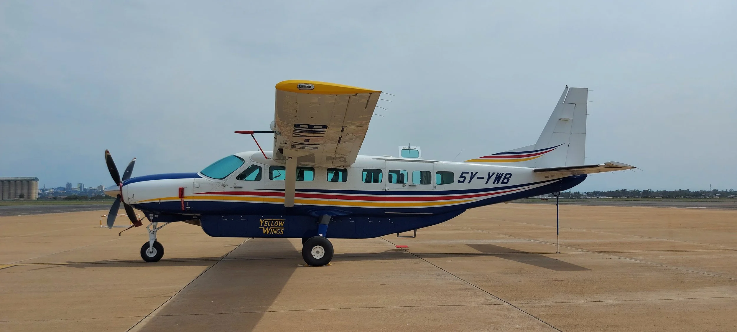 Cessna Caravan with mountain backdrop