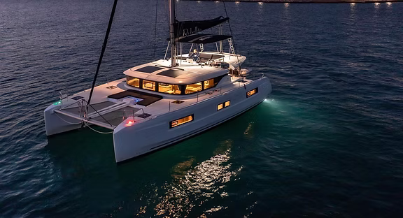Luxury Lagoon 46 catamaran illuminated at night