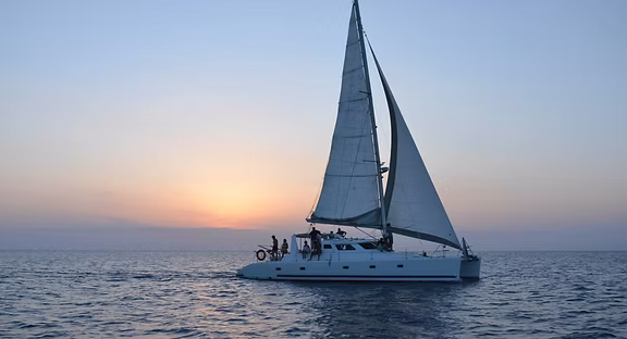 Voyage 500 catamaran at sunset